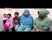 Persit KCK Koorcab Rem 011 PD IM Menyerahkan bantuan kepada janda anak tiga