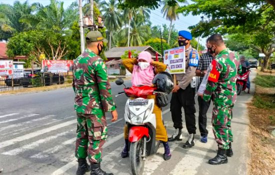 Sosialisasi Prokes di Darul Aman, Anggota TNI-Polri Bersinergi Bagikan Masker